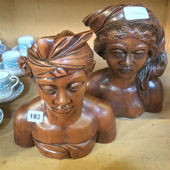 2 carved Balinese busts